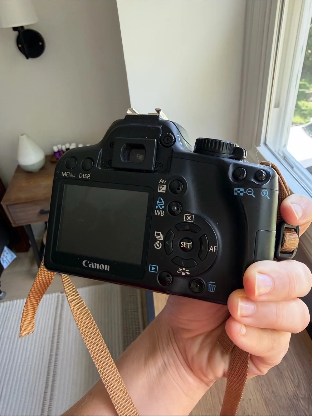 Canon Black DSLR Camera with 18-55mm Lens and Black Strap